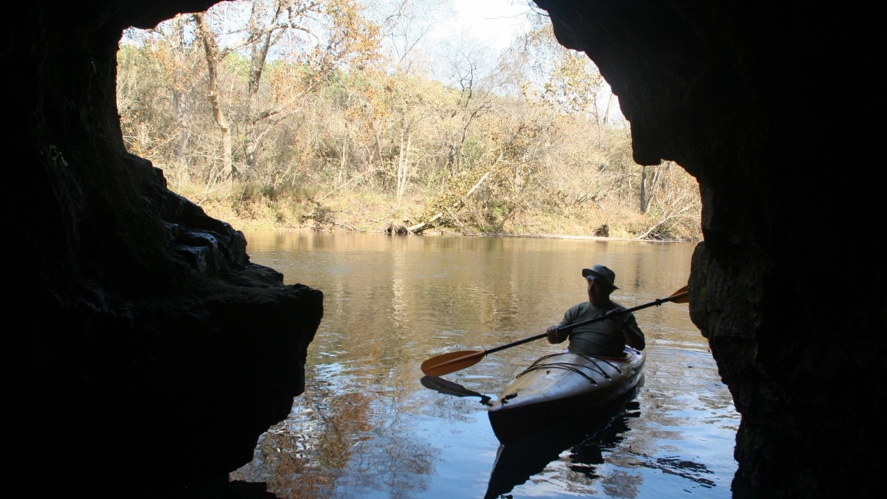 Ozark rivers are lined with bluffs that include float-in caves for exploring.