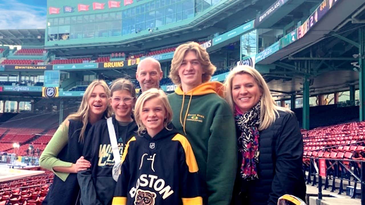 Maher family poses at Fenway Park in Boston.